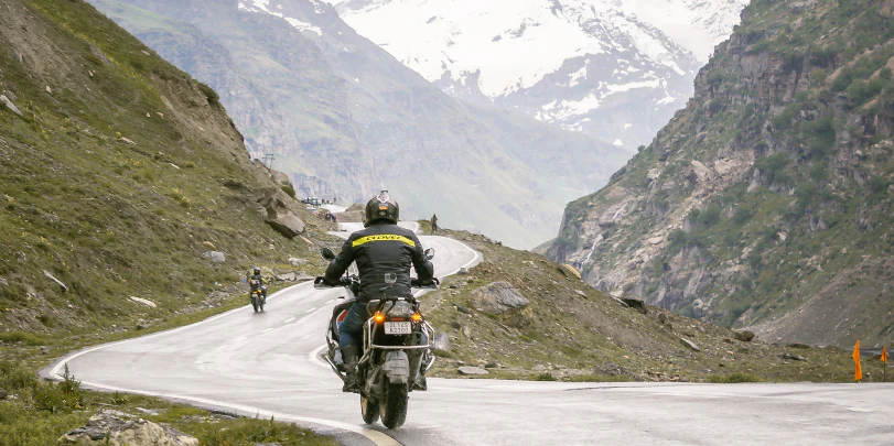 Motorcyclist riding down the canyon roads